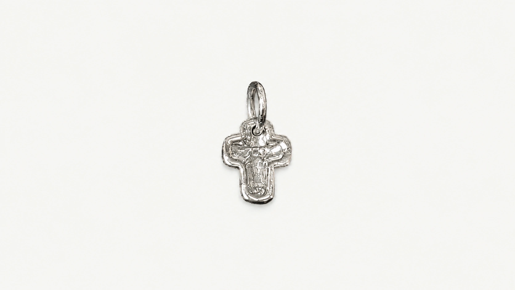 Foto 3: H STERN - Pingente modelo cruz em ouro branco 18k com diamante. Peso: 1,3 gramas. Medida: 1,3 cm com argola.