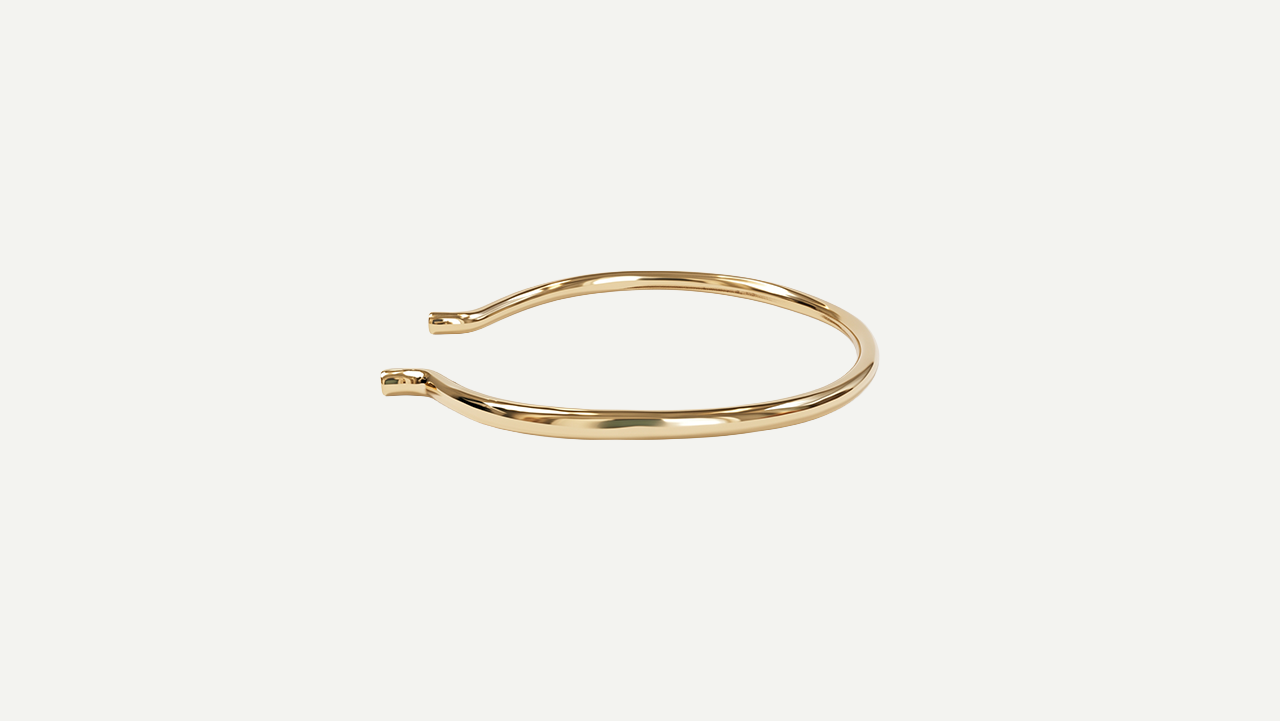 Foto 3: Bracelete em ouro amarelo 18k, com aproximadamente 0.10 cts de diamantes. Peso: 6,4 gramas. Medida: 6 cm de diâmetro.
