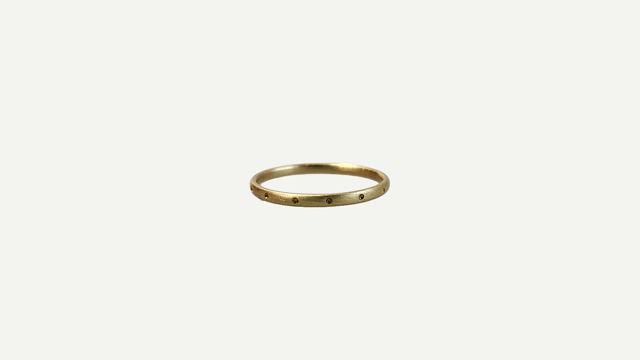 Foto 9 de 11: ANTONIO BERNARDO - Conjunto de oito anéis Antonio Bernardo em ouro amarelo 18k, sendo um com diamante e um com turmalina paraíba. Peso: 10,1 gramas. Aro: 18,5.