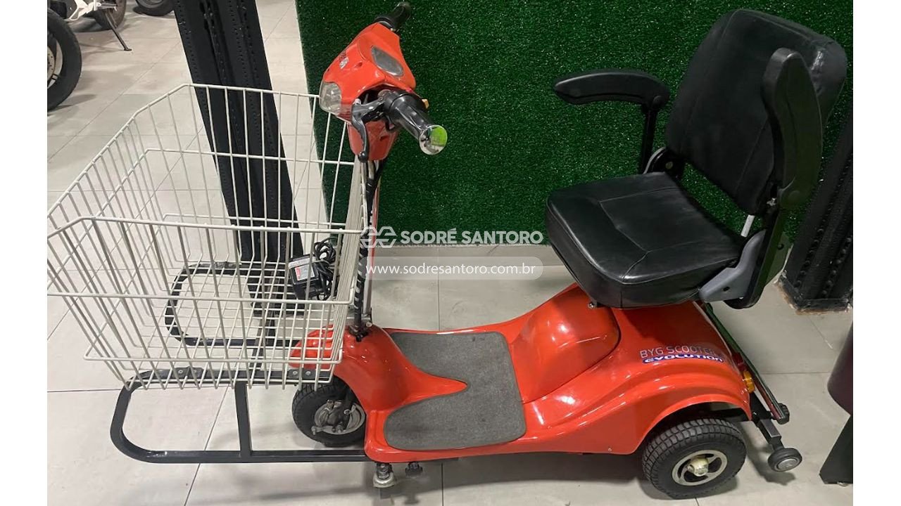 Foto 2: triciclo elétrico 12v laranja com cesto de carga