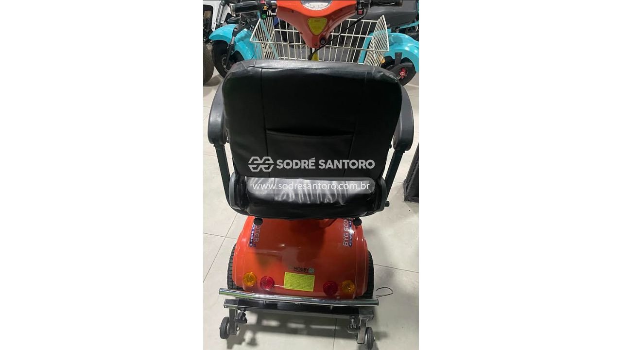 Foto 4: triciclo elétrico 12v laranja com cesto de carga