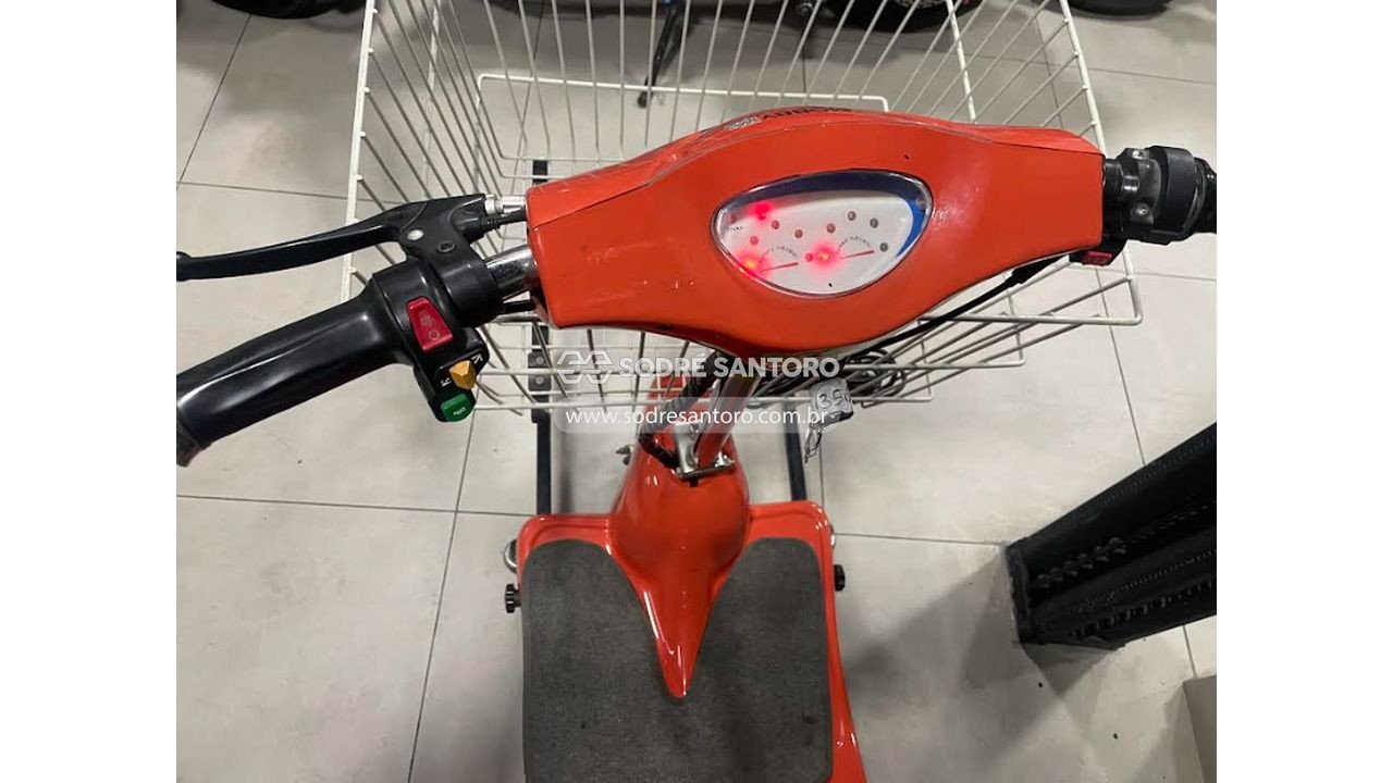 Foto 5: triciclo elétrico 12v laranja com cesto de carga